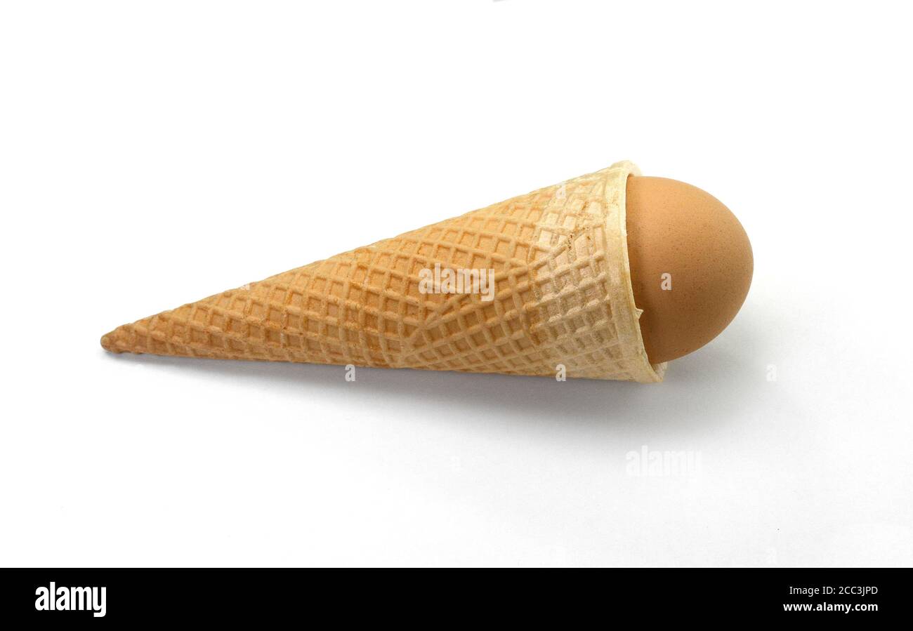 egg in waffle cup isolated Stock Photo