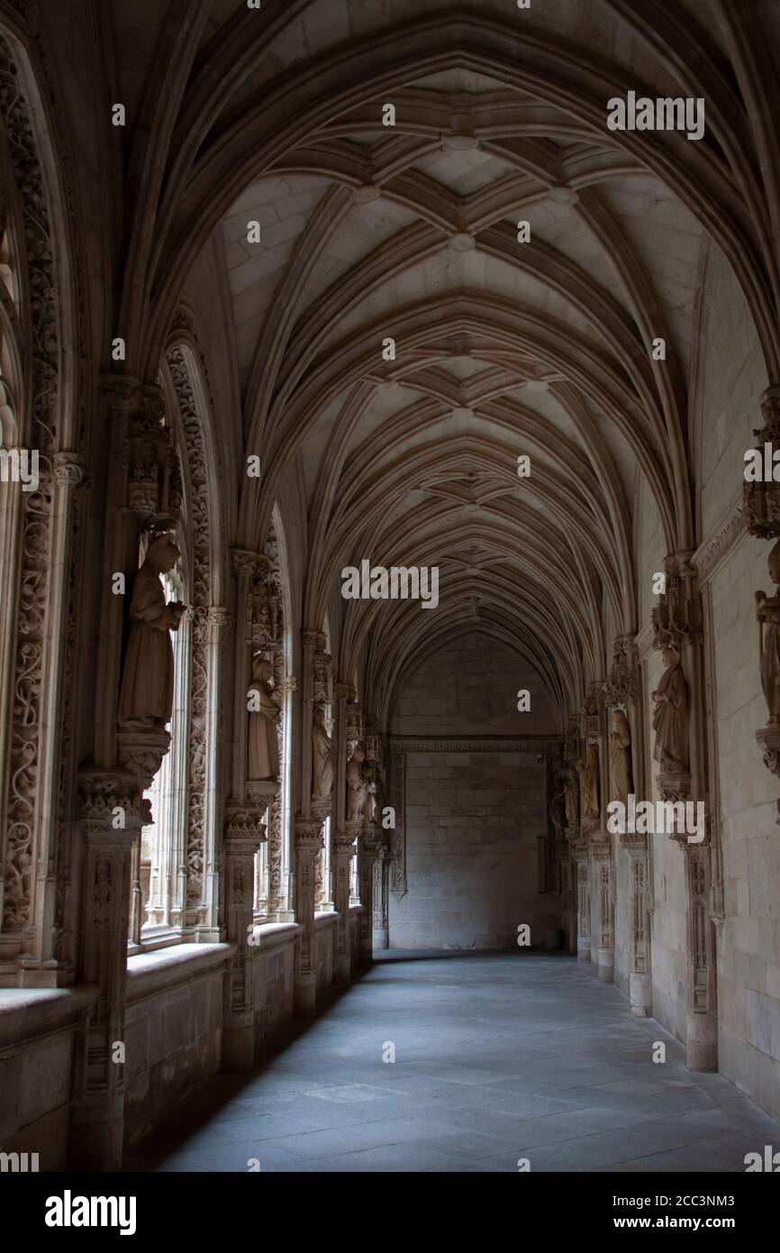 Toledo, Spain- August, 2020: Empty and dark gallery inside Monastery of San Juan de los Reyes in old town Toledo, wolrd heritage site by UNESCO Stock Photo