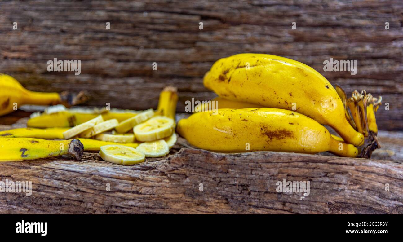 Sliced bananas. Fruit rich in vitamins A, B and C. The presence of three different types of natural sugars, sucrose, fructose and glucose, make the ba Stock Photo