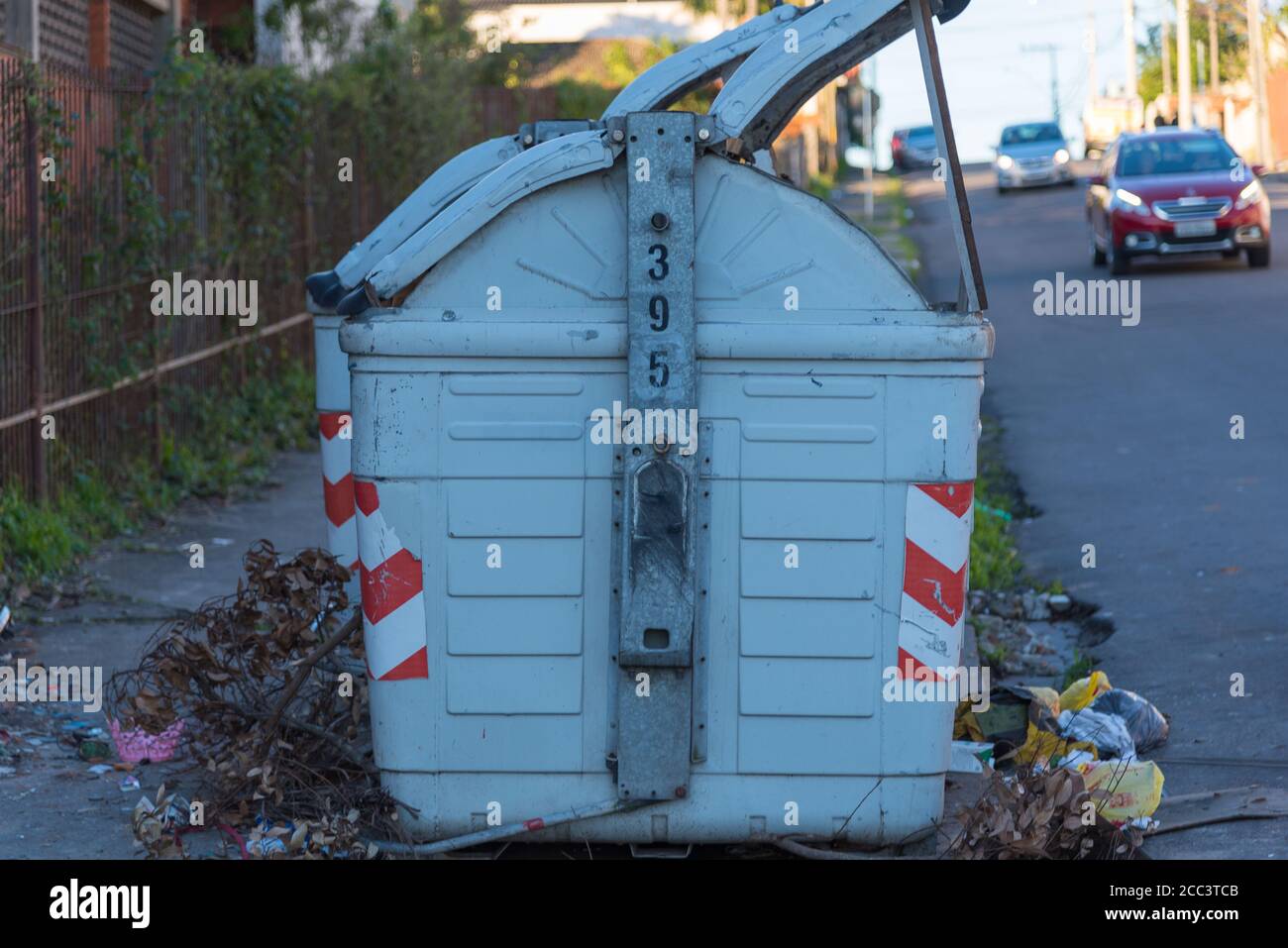 Collective garbage collector placed in the street to attend a