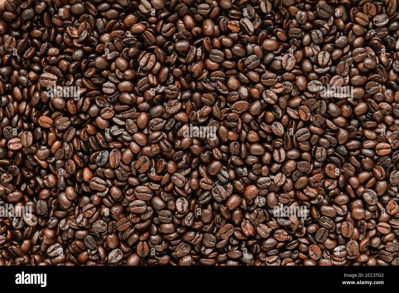 Freshly Roasted Coffee Beans Background Stock Photo