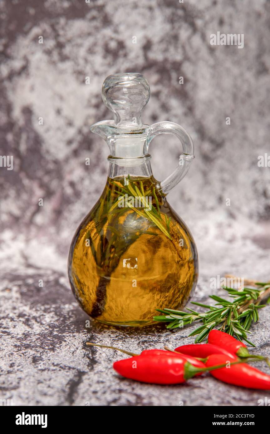Fresh Rosemary Infused olive oil Stock Photo Alamy