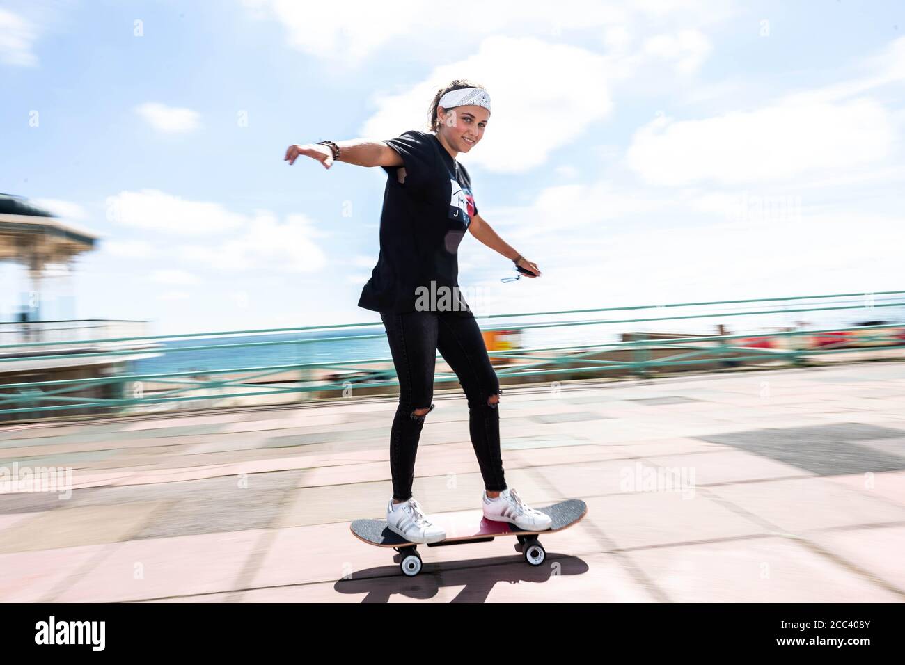 EDITORIAL USE ONLY Charlotte Geary, 13, from Bournemouth, winner of the  IET's 'Sports of the Future' competition, demonstrates a prototype of her  winning invention ??? the Electrodeck, an electric skateboard that allows