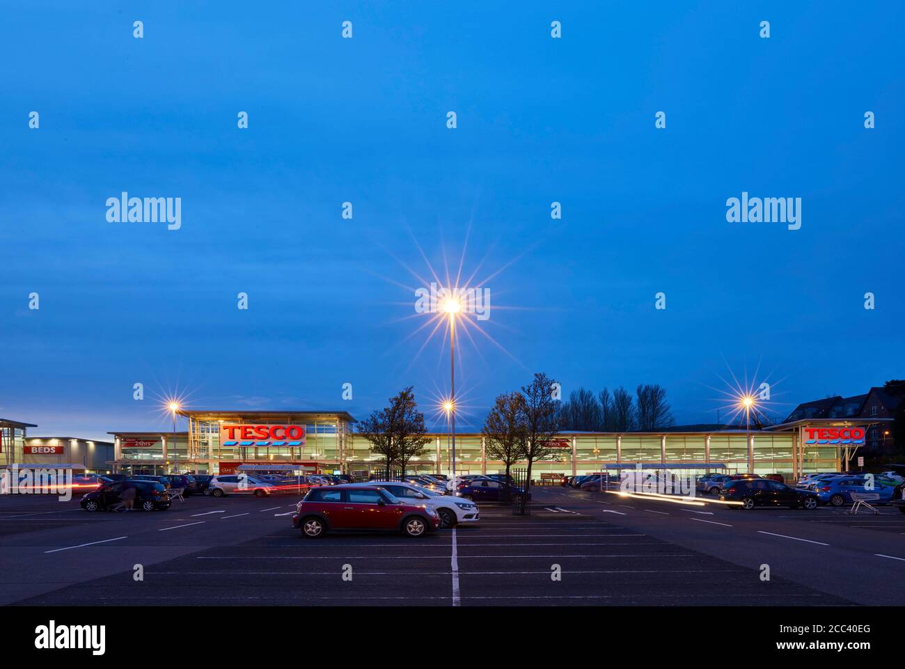 Tesco car park. Abbey Retail Park, Belfast, Belfast, Ireland. Architect: N/A, 2019. Stock Photo