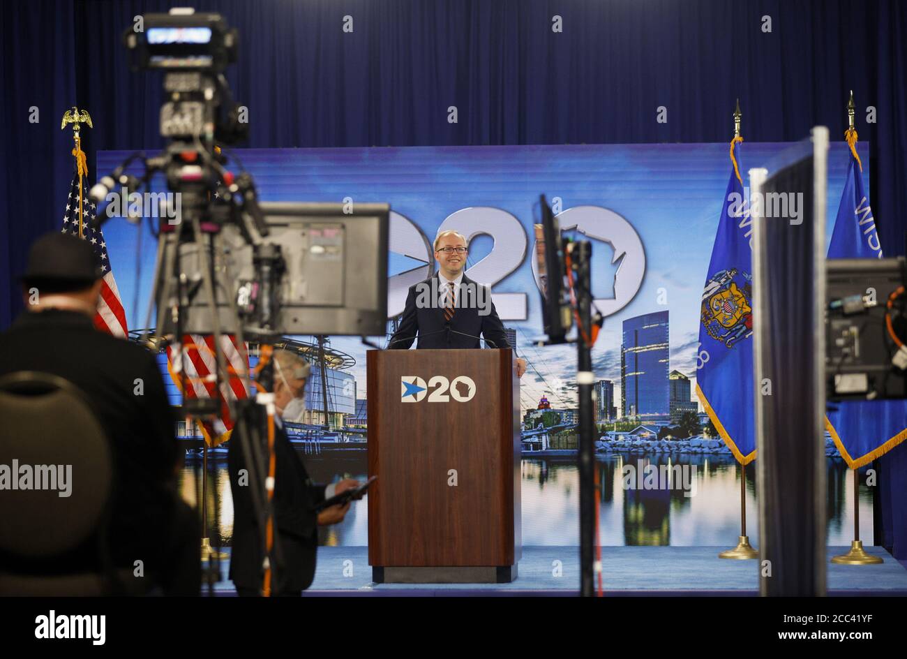 Milwaukee, United States. 18th Aug, 2020. Convention Secretary Jason Rae is seen from behind television cameras and video monitors as he directs a virtual roll call vote of the states as delegates cast their votes for former Vice President Joe Biden to become their 2020 nominee for president from locations across the country on the second night of the virtual 2020 Democratic National Convention at its hosting site in Milwaukee, Wisconsin on Tuesday, August 18, 2020. Pool photo by Brian Snyder/UPI Credit: UPI/Alamy Live News Stock Photo