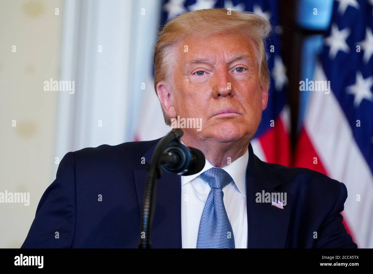 US President Donald J. Trump delivers remarks during a signing ceremony to mark the 100th Anniversary of the Ratification of the 19th Amendment at the White House in Washington, DC, USA, 18 August 2020. This year marks the 100th anniversary of the 19th amendment in the United States, which guaranteed American women the right to vote. Credit: Anna Moneymaker/Pool via CNP /MediaPunch Stock Photo