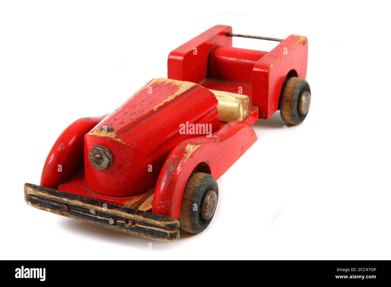 old red wooden car toy isolated on the white background Stock Photo - Alamy