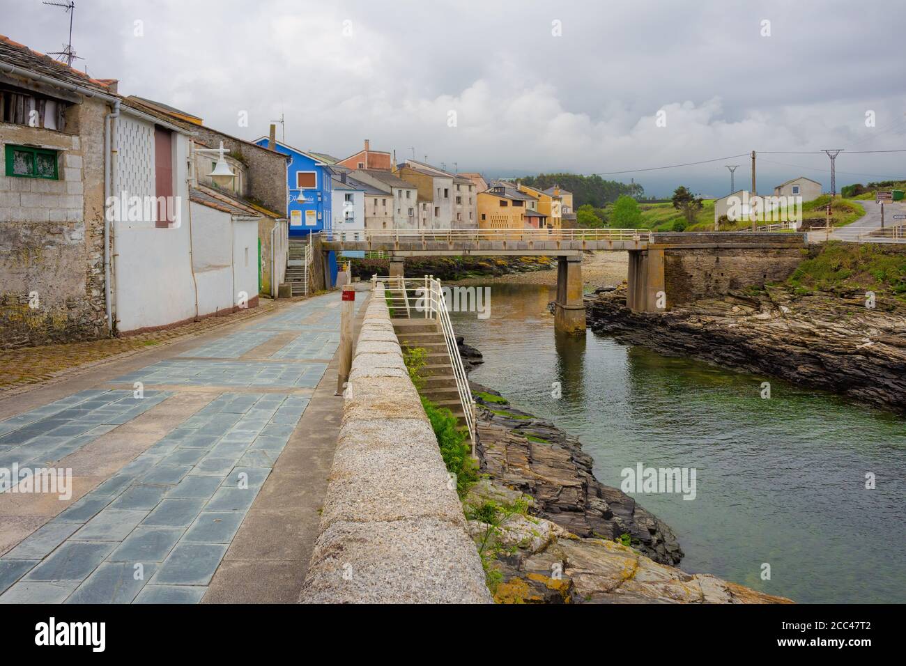 Panoramic view of the town of Rinlo with the river Da Areosa, Galicia ...