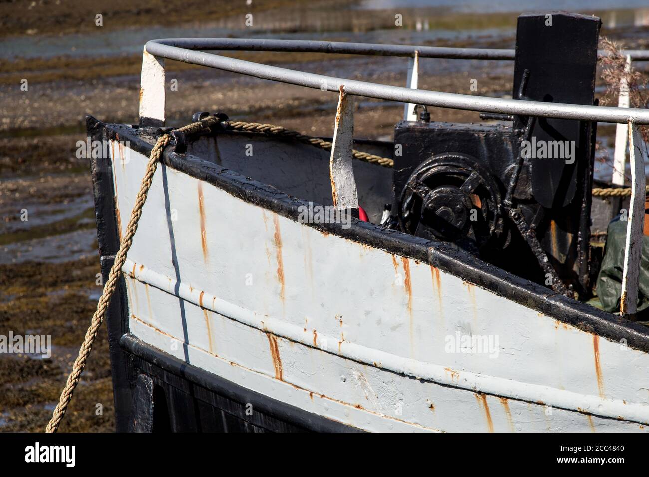 Old fishing boat bow section in a seaside harbour Stock Photo