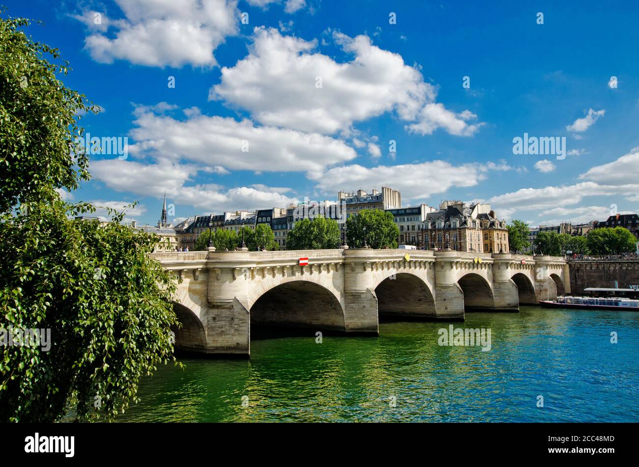 The Pont Neuf (English: new bridge) is the oldest surviving bridge over the Seine in Paris. The construction began in 1578, and lasted until 1607. Stock Photo