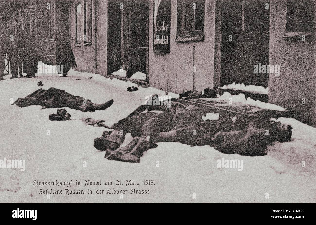 World War I period. Retro postcard o the street fights in the city of Memel on March 21, 1915. Fallen Russians in the Libauer street. 1915 Stock Photo