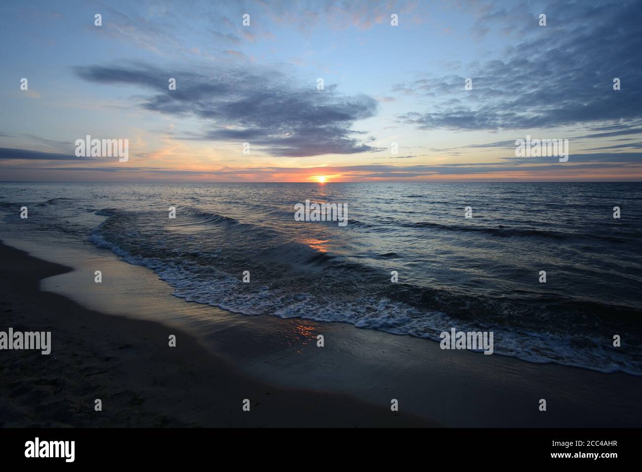 Sunset on the Baltic coast Stock Photo - Alamy