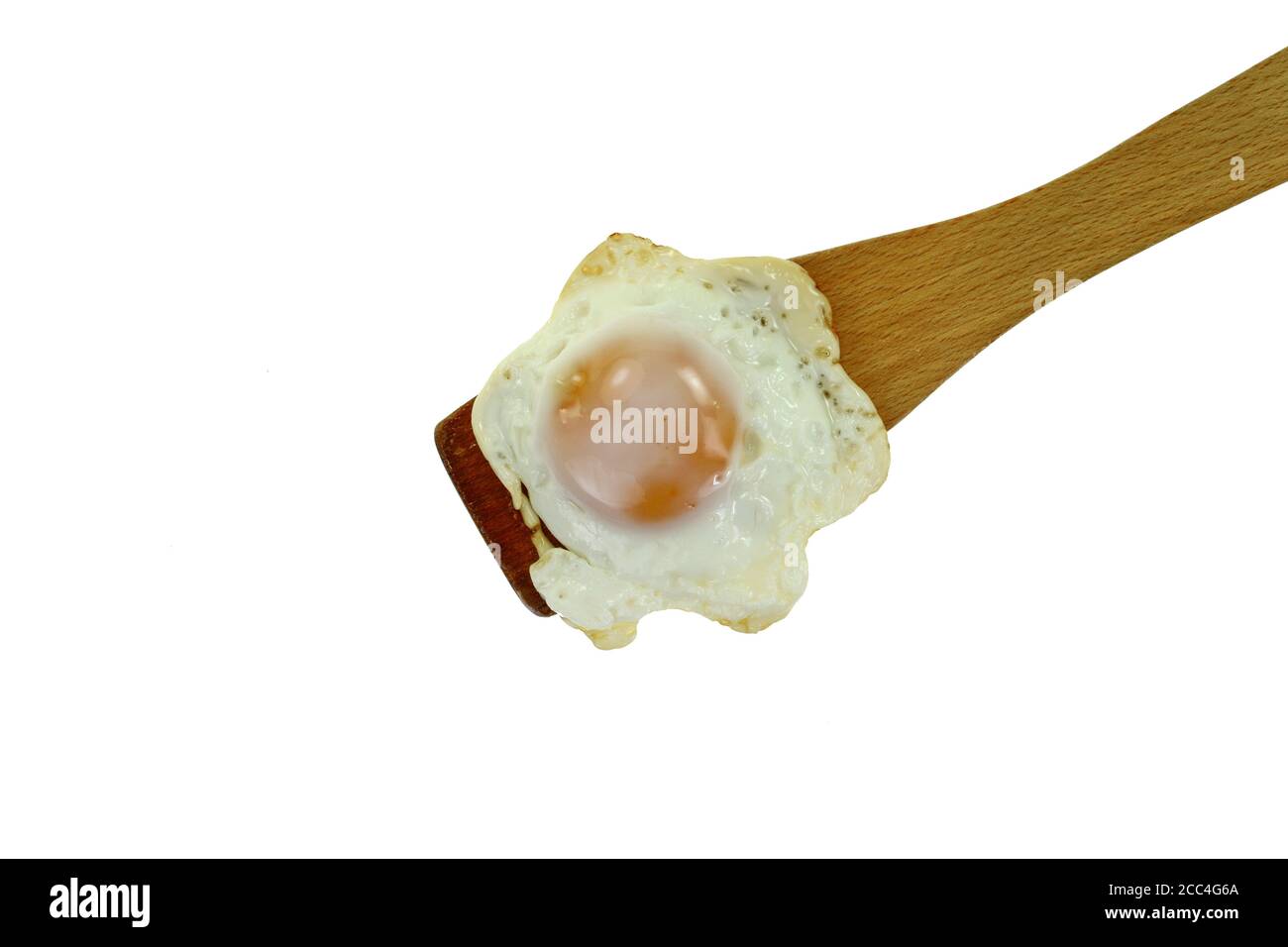 Fried egg on a plate isolated on white background Stock Photo - Alamy