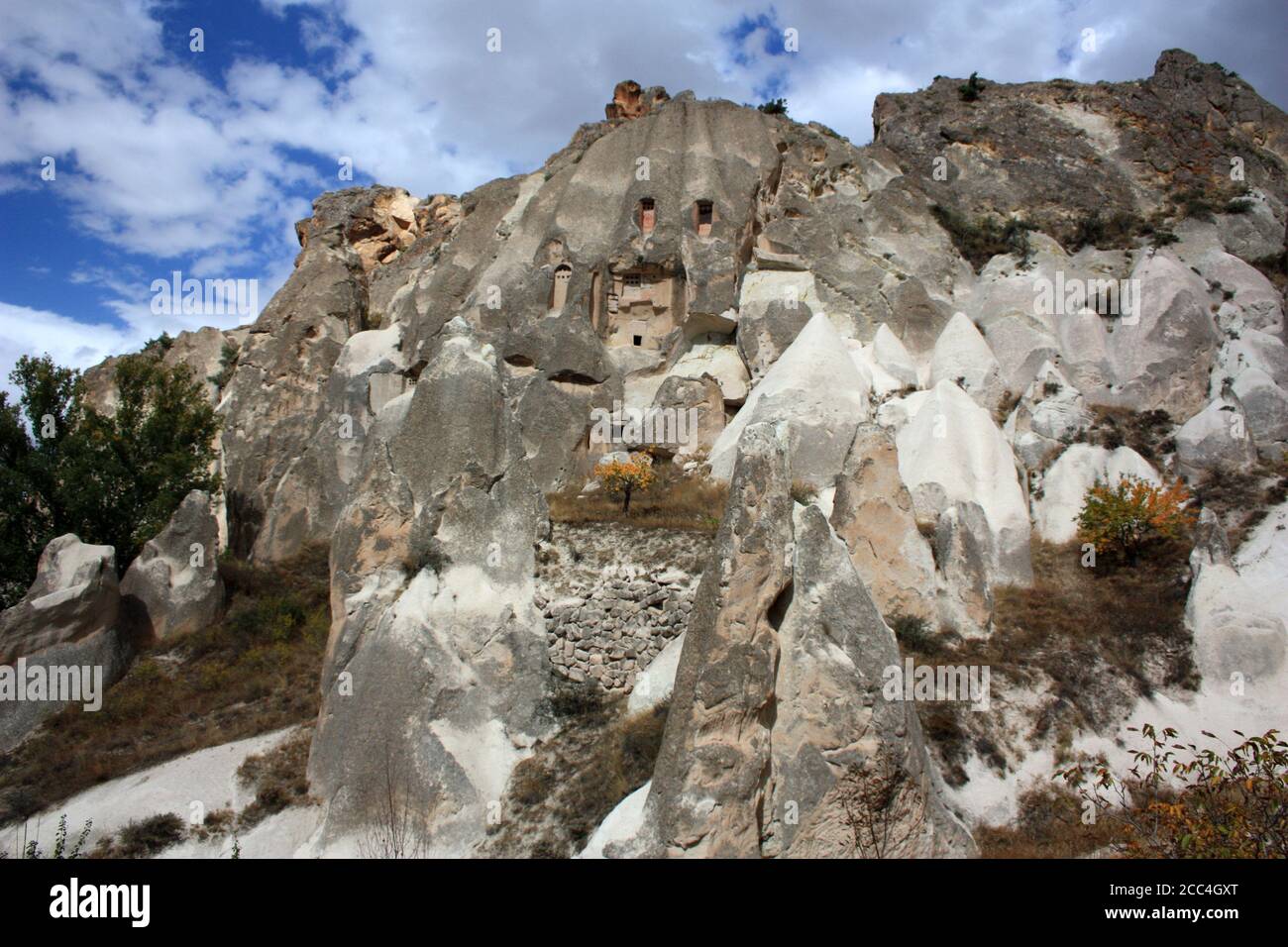 Cliff dwelling in tuff stone formation in Cappadocia, Turkey Stock