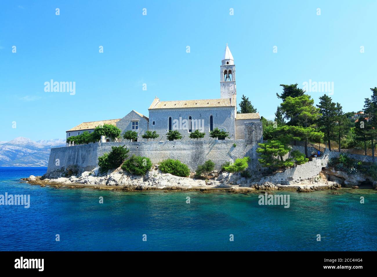 Old stone church and Franciscan monastery on island Lopud near Dubrovnik, famous touristic destination in Croatia Stock Photo