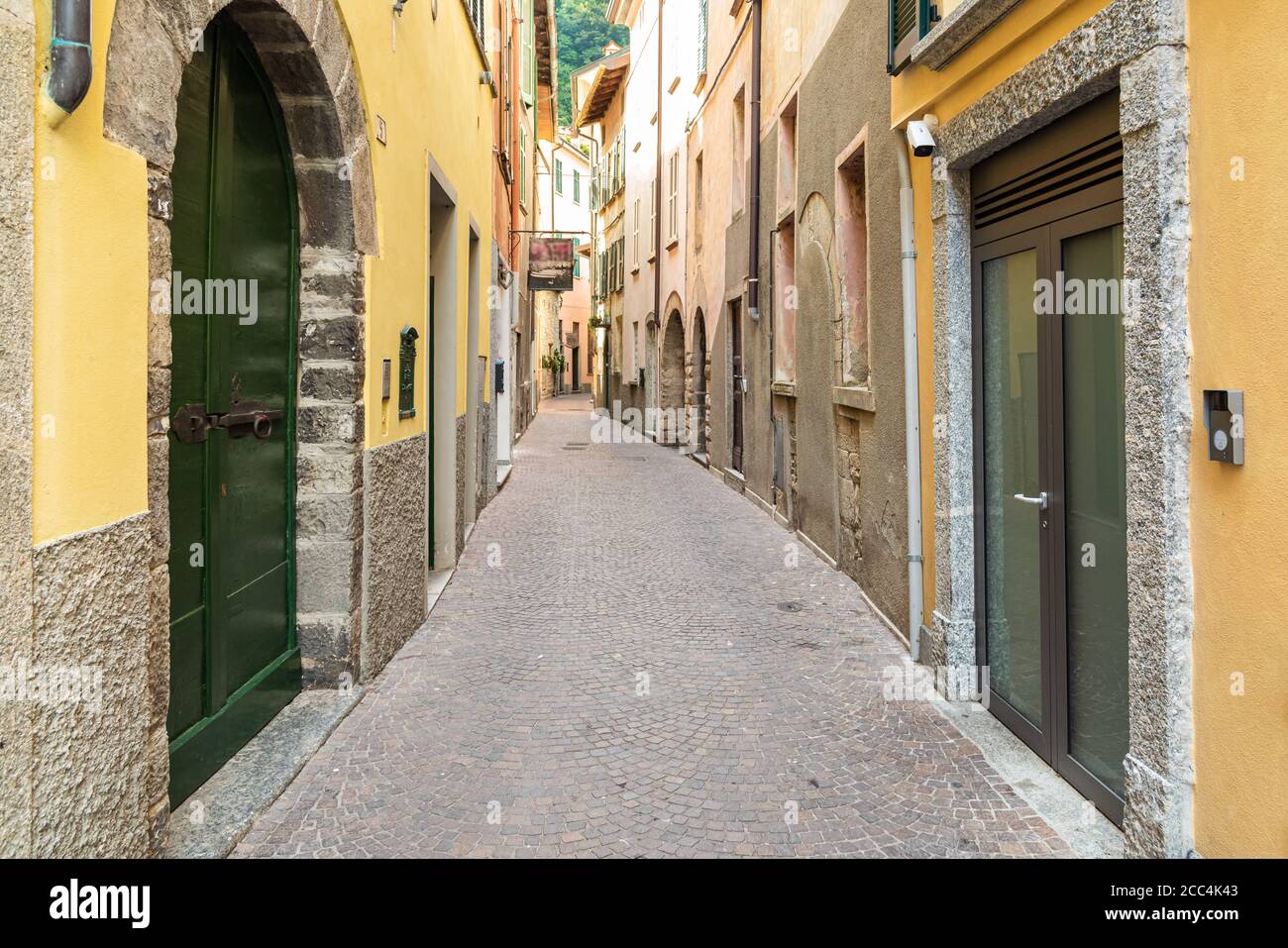 Narrow street of ancient village Torno, overlooking Lake Como, Lombardy, Italy Stock Photo