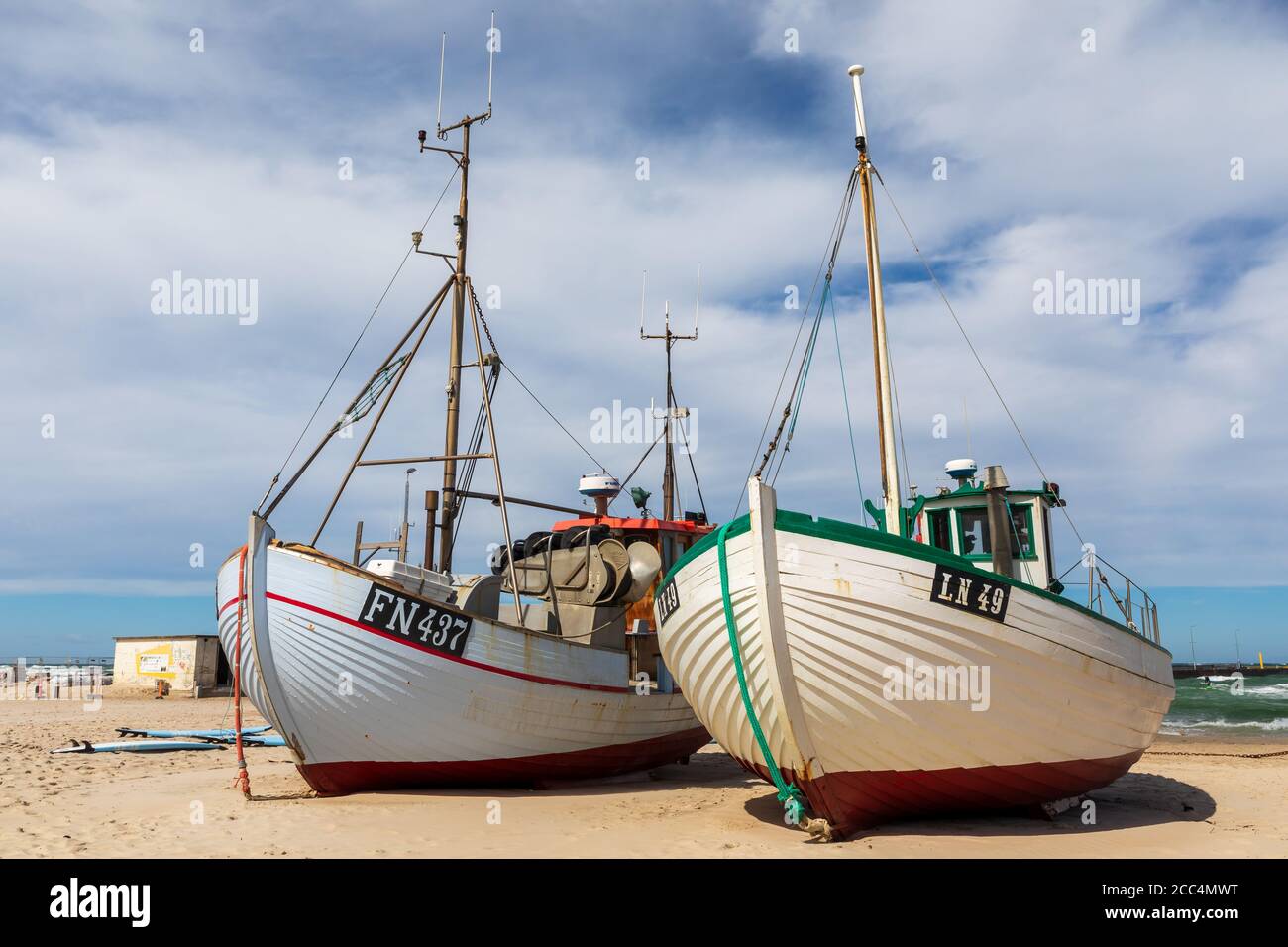 Small traditional and colorful Danish fishing boats on the beach