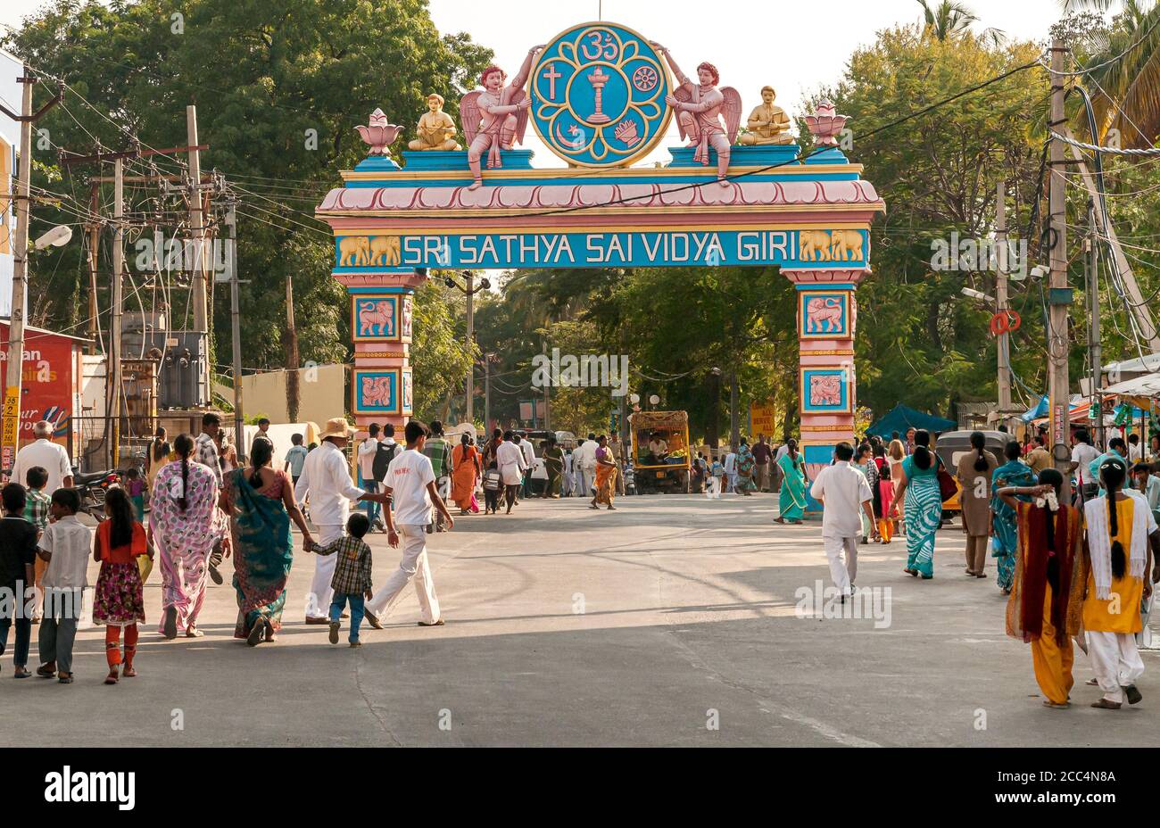 Puttaparthi, Andhra Pradesh, India - January 11, 2013: The symbolic archway to access Puttaparthi village, urban scene, India Stock Photo