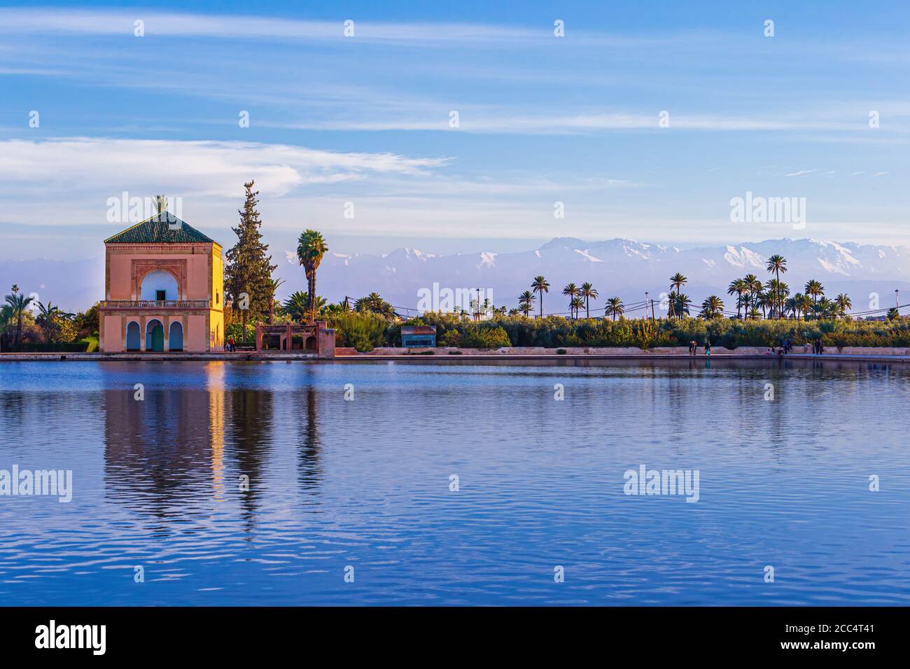 Menara Pavilion reflected on pond and Atlas mountains - Marrakesh, Morocco Stock Photo