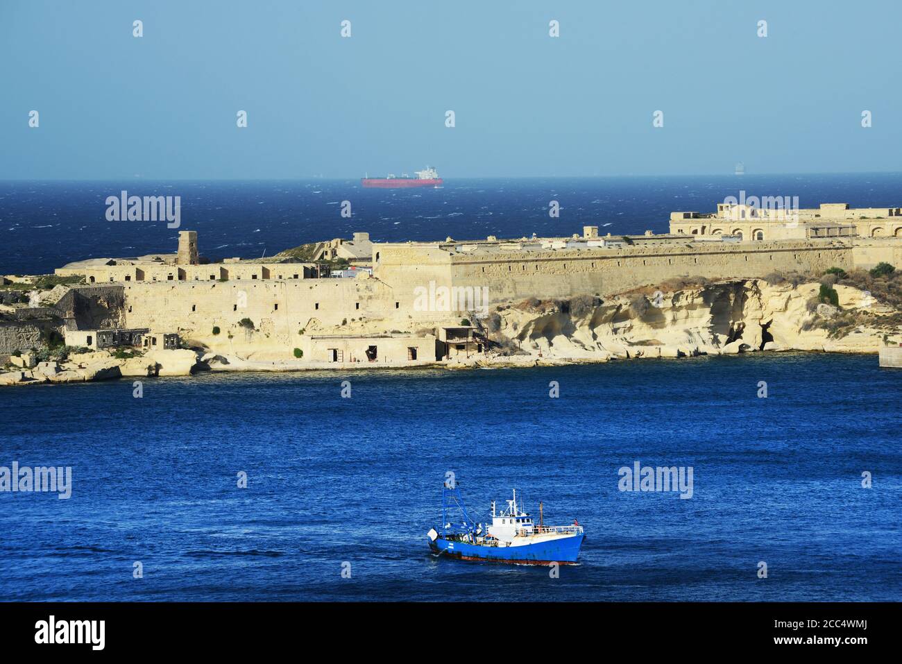 A view of the Fort Ricasoli from Valletta, Malta. Stock Photo