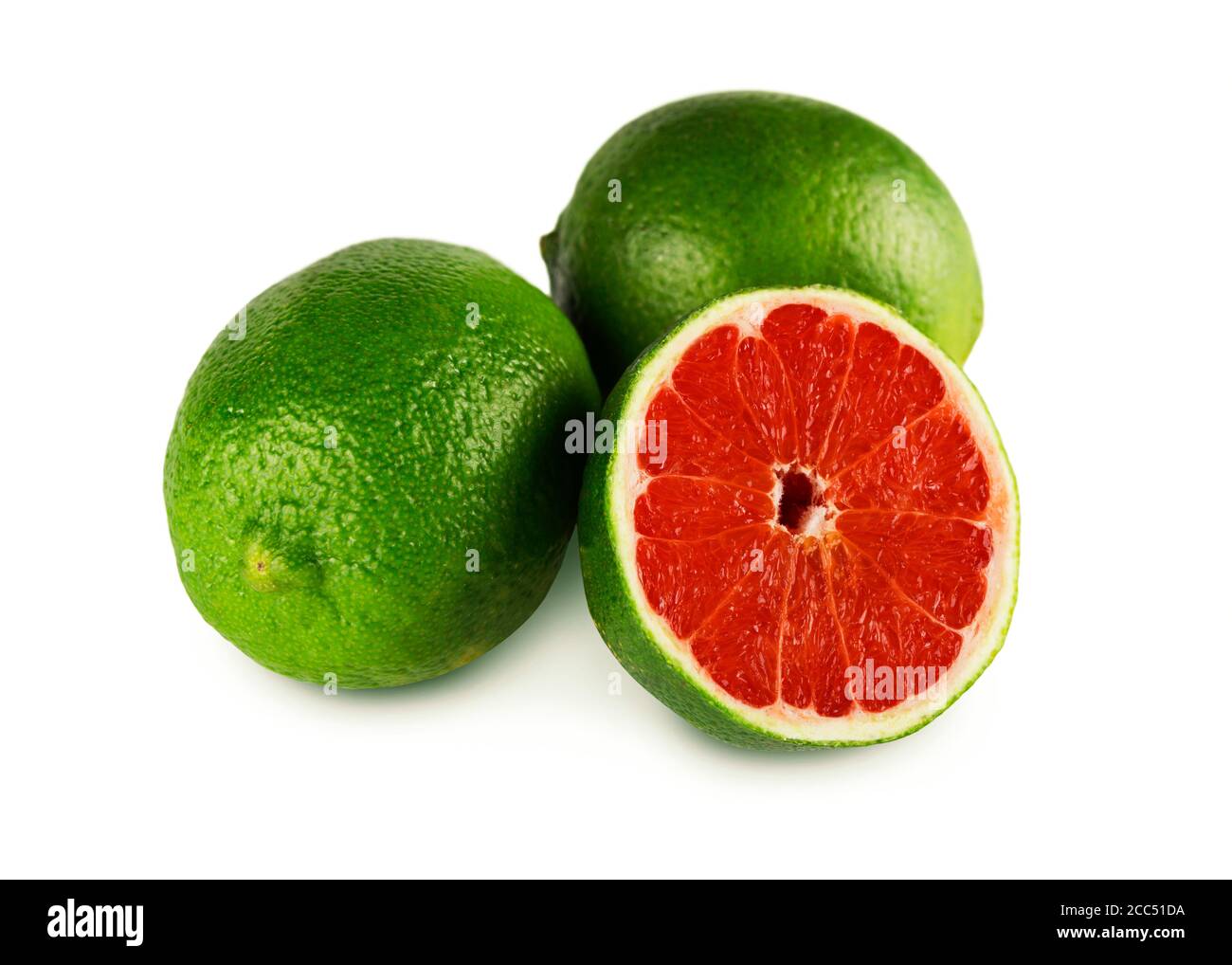 modified lime fruits with grapefruit center on white