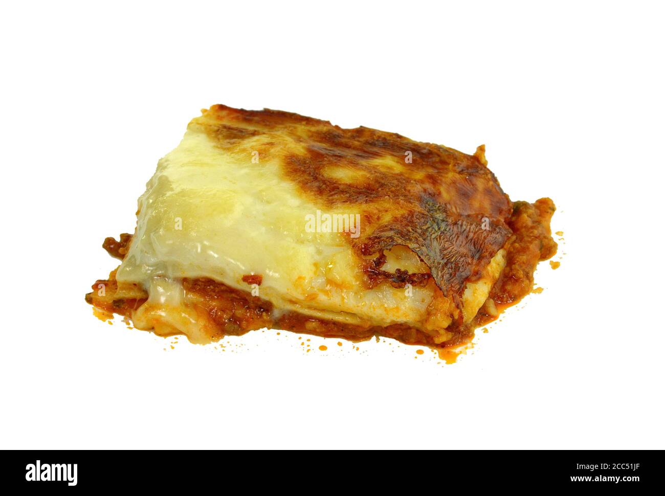 Portion of tasty lasagna. An isolated traditional lasagna made with minced beef bolognaise sauce. Tasty serving of traditional Italian lasagne with sp Stock Photo