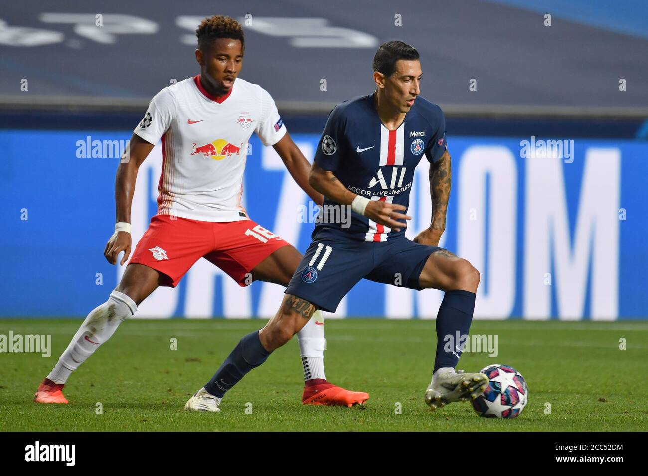 Lisbon, Lissabon, Portugal, 18th August 2020.  Christopher NKUNKU, RB Leipzig 18  compete for the ball, tackling, duel, header, zweikampf, action, fight against Angel DI MARIA, PSG 11  in  the semifinal match UEFA Champions League, final tournament RB LEIPZIG - PARIS SG 0-3 in season 2019/2020,  Photographer: © Peter Schatz / Alamy Live News / Frank Hoermann/ SVEN SIMON/ Pool   - UEFA REGULATIONS PROHIBIT ANY USE OF PHOTOGRAPHS as IMAGE SEQUENCES and/or QUASI-VIDEO -  National and international News-Agencies OUT Editorial Use ONLY Stock Photo