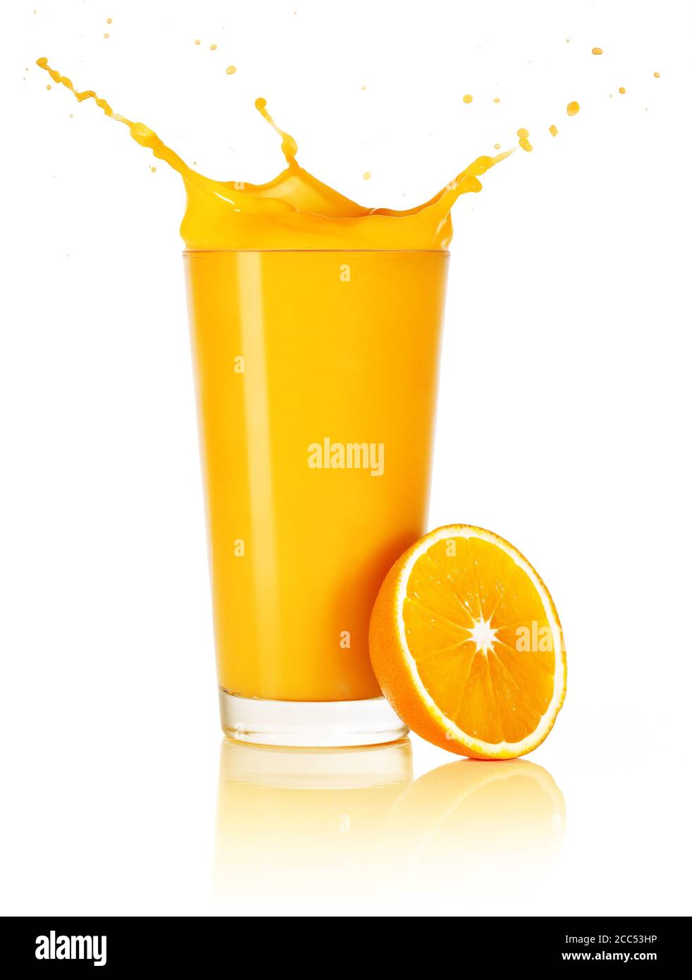 orange juice with splash and half fruit isolated on white Stock Photo