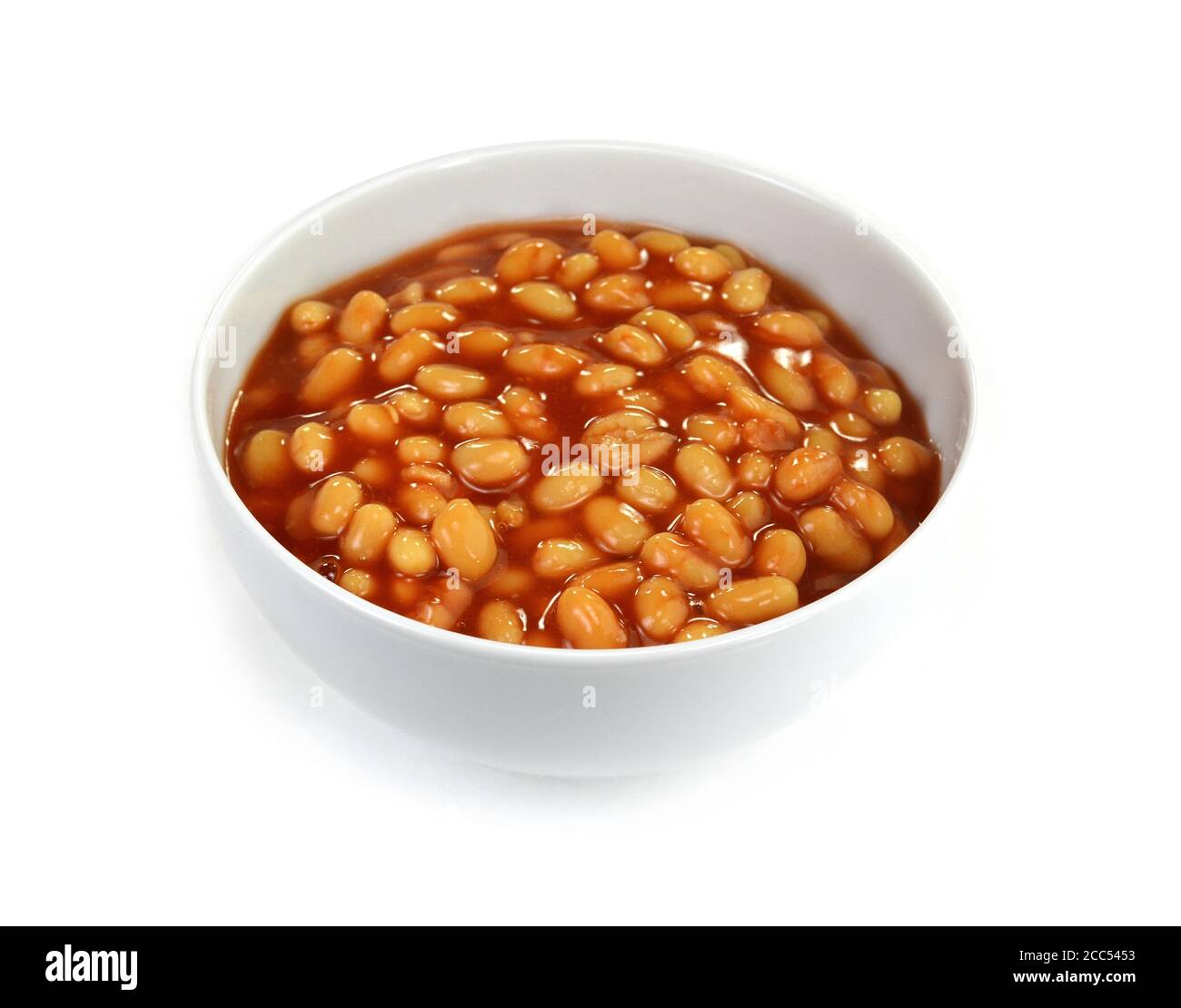 Baked Beans Bowl of baked beans in tomato sauce isolated on a white