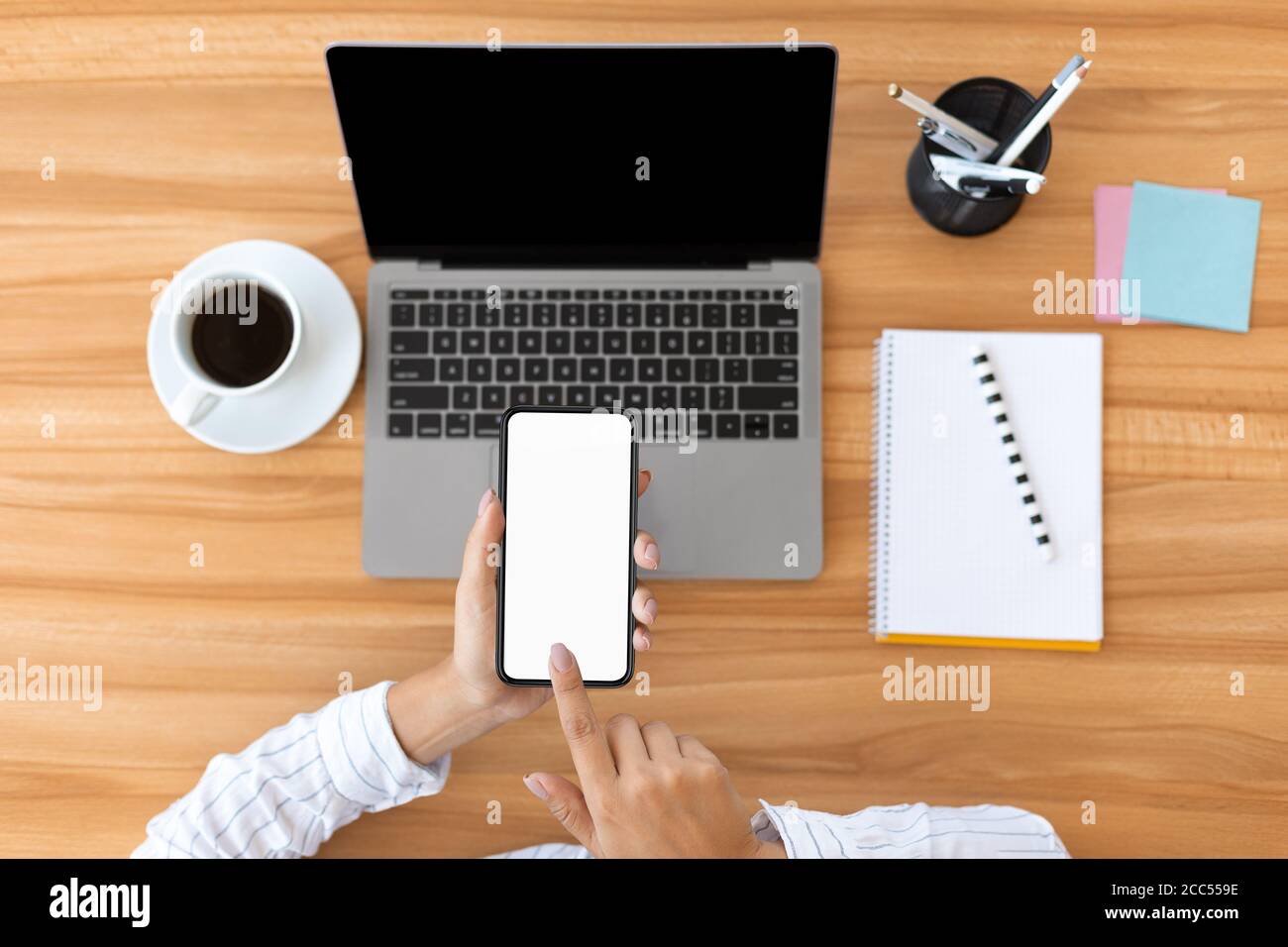 Using Phone Top View Top view female using smart phone with mockup Stock Photo - Alamy