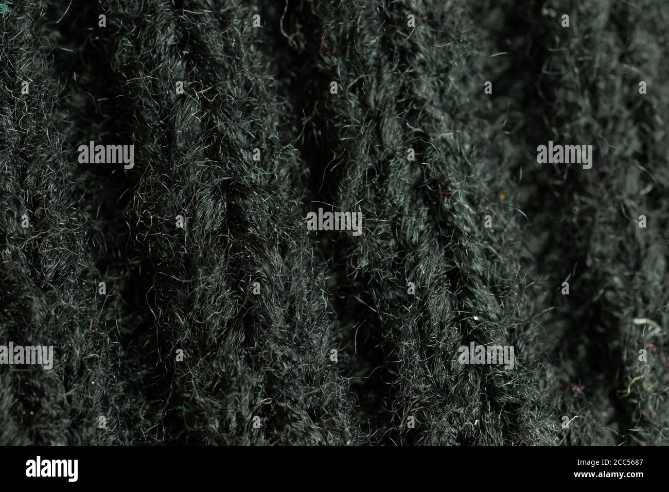 Black cloth textile fabric texture background macro shot Stock Photo
