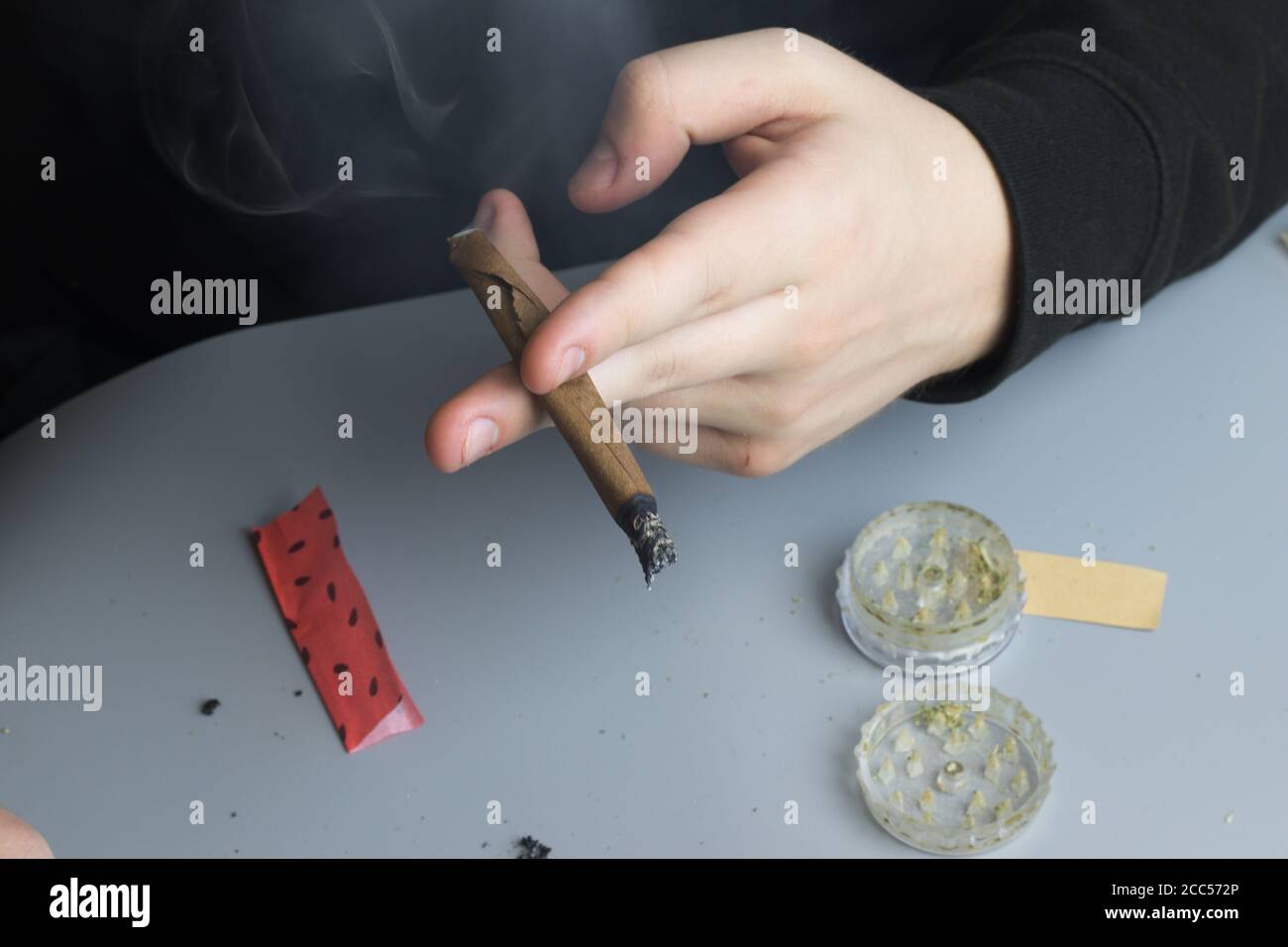 Blunt smoking. Cannabis medical and recreational use. Legal weed Stock Photo