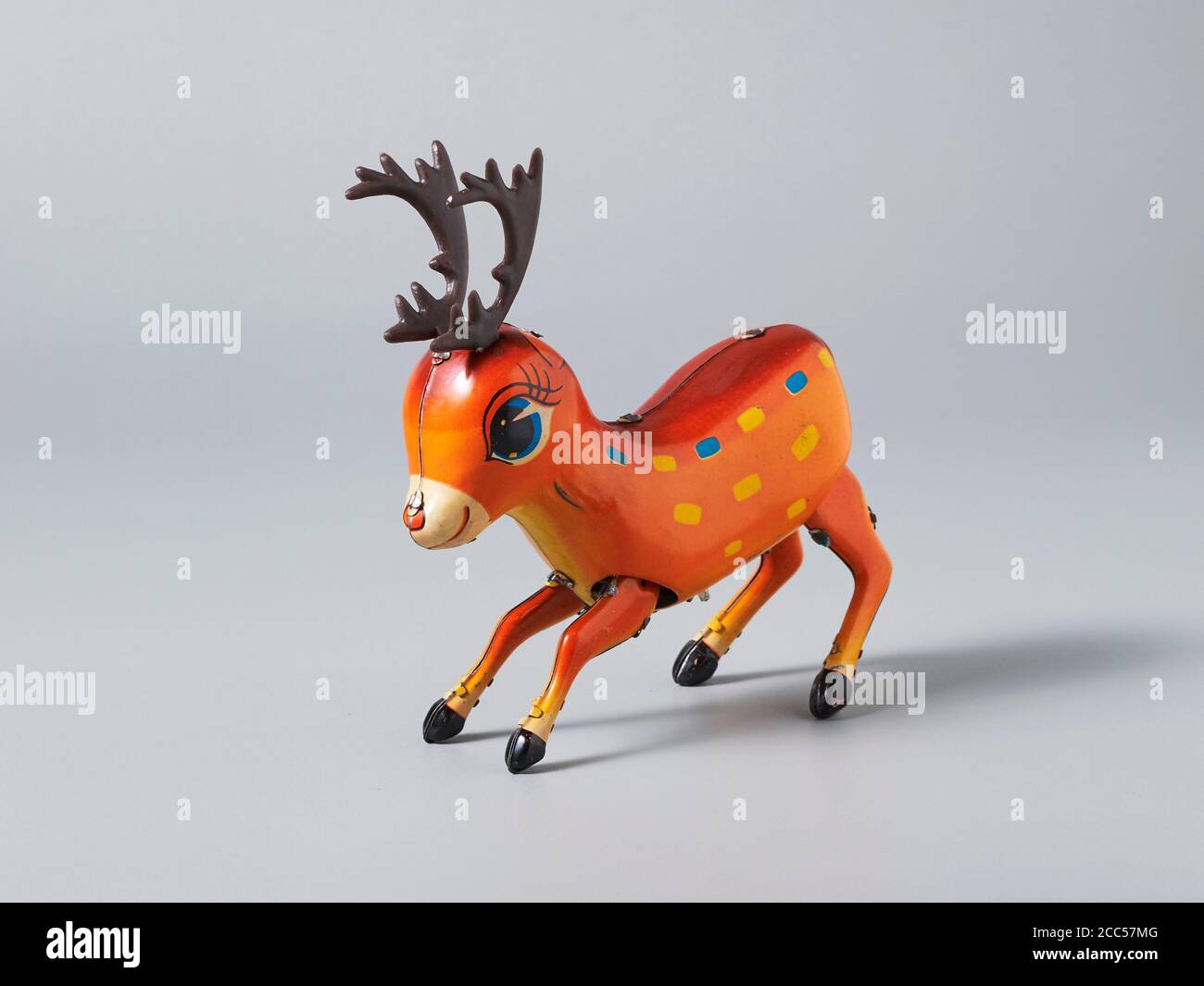 A reindeer tin toy made in China that can move mechanically with a key Stock Photo