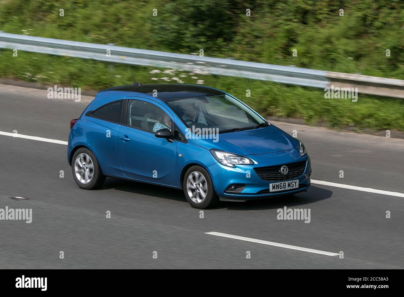 2018 Vauxhall Corsa Griffin Blue Car Hatchback Petrol driving on the M6 motorway near Preston in Lancashire, UK. Stock Photo