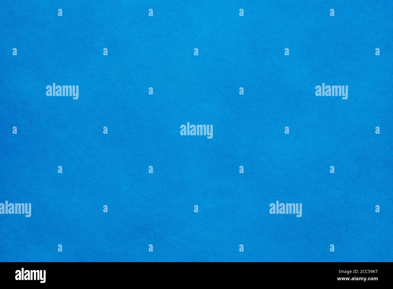 Paper background. The paper texture is blue. An empty page with a copy of the space. Stock Photo