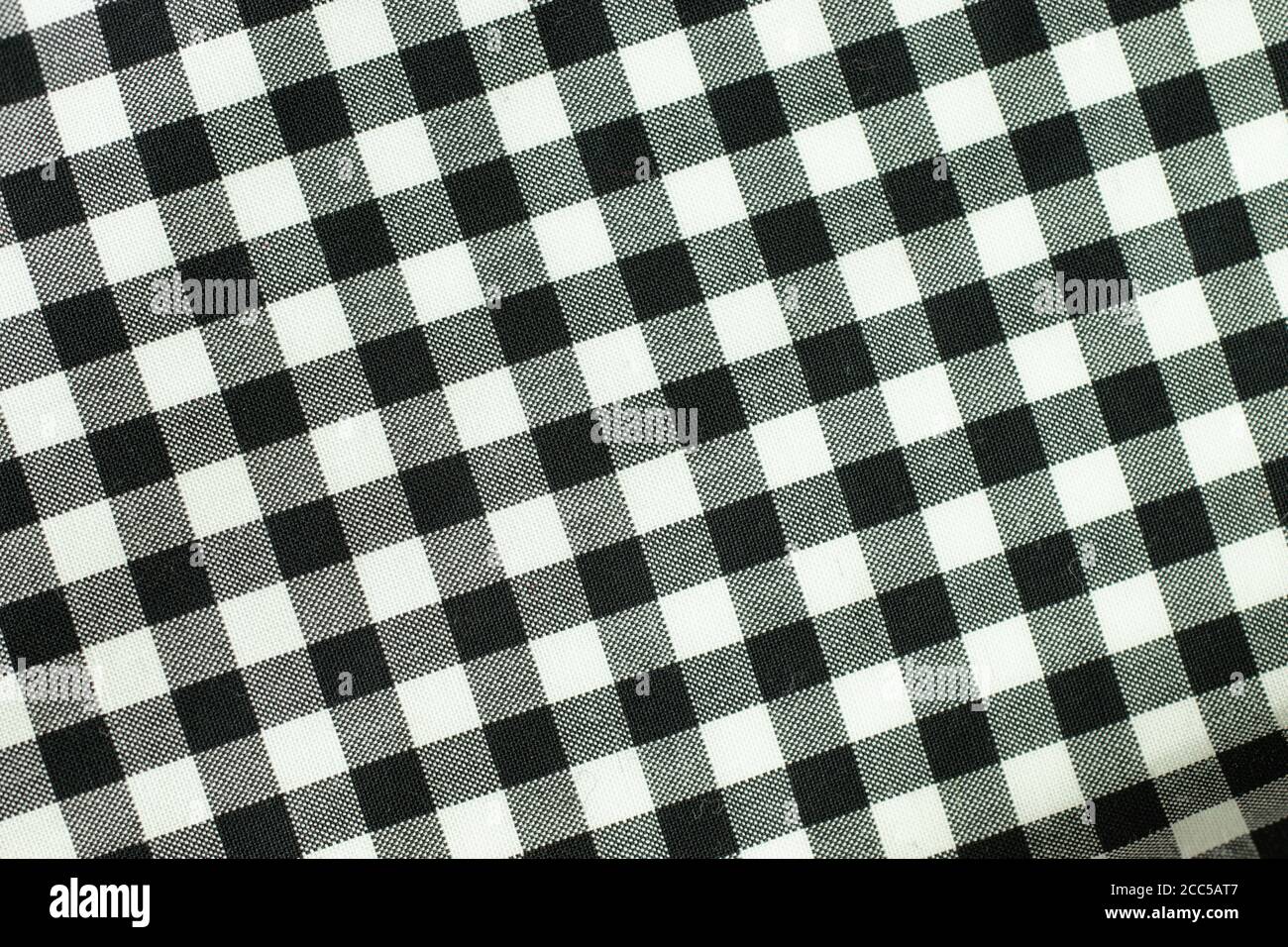 White, black and gray checkered boxes cell. Fabric texture background Stock Photo