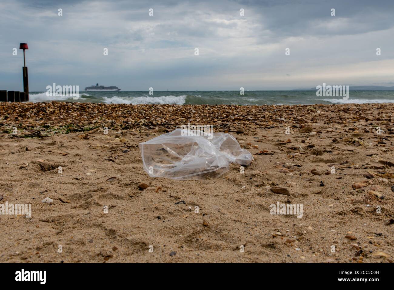 Plastic Pollution: Plastic waste left by tourists on the beach. Bournemouth, UK. Stock Photo