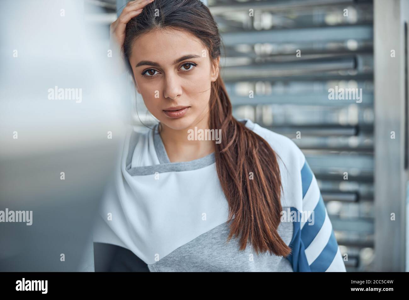 Beautiful woman in casual clothes staring forward Stock Photo