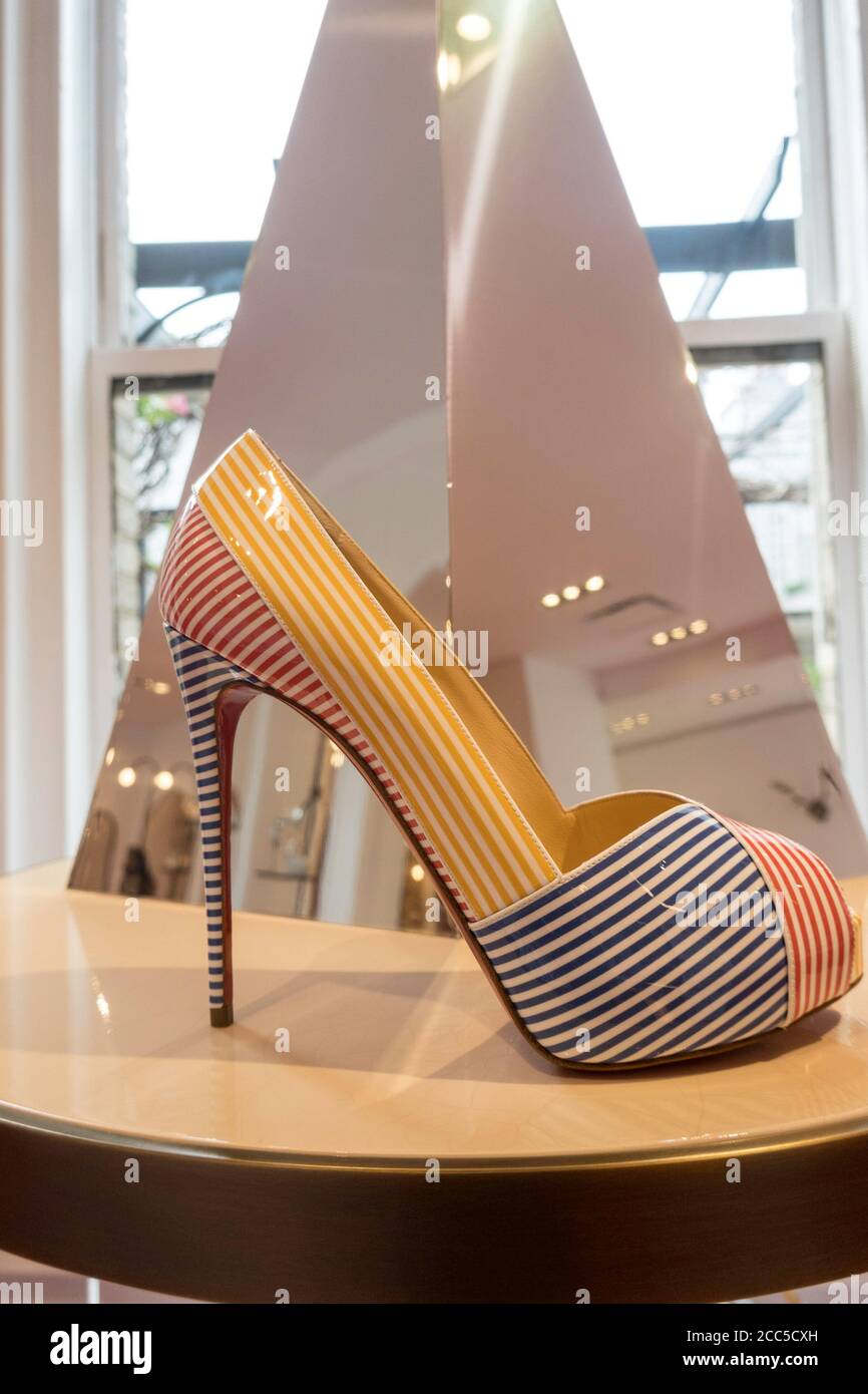 Christian Louboutin Designer Shoes at the Saks Fifth Avenue Flagship Store in New City, USA Stock Photo -
