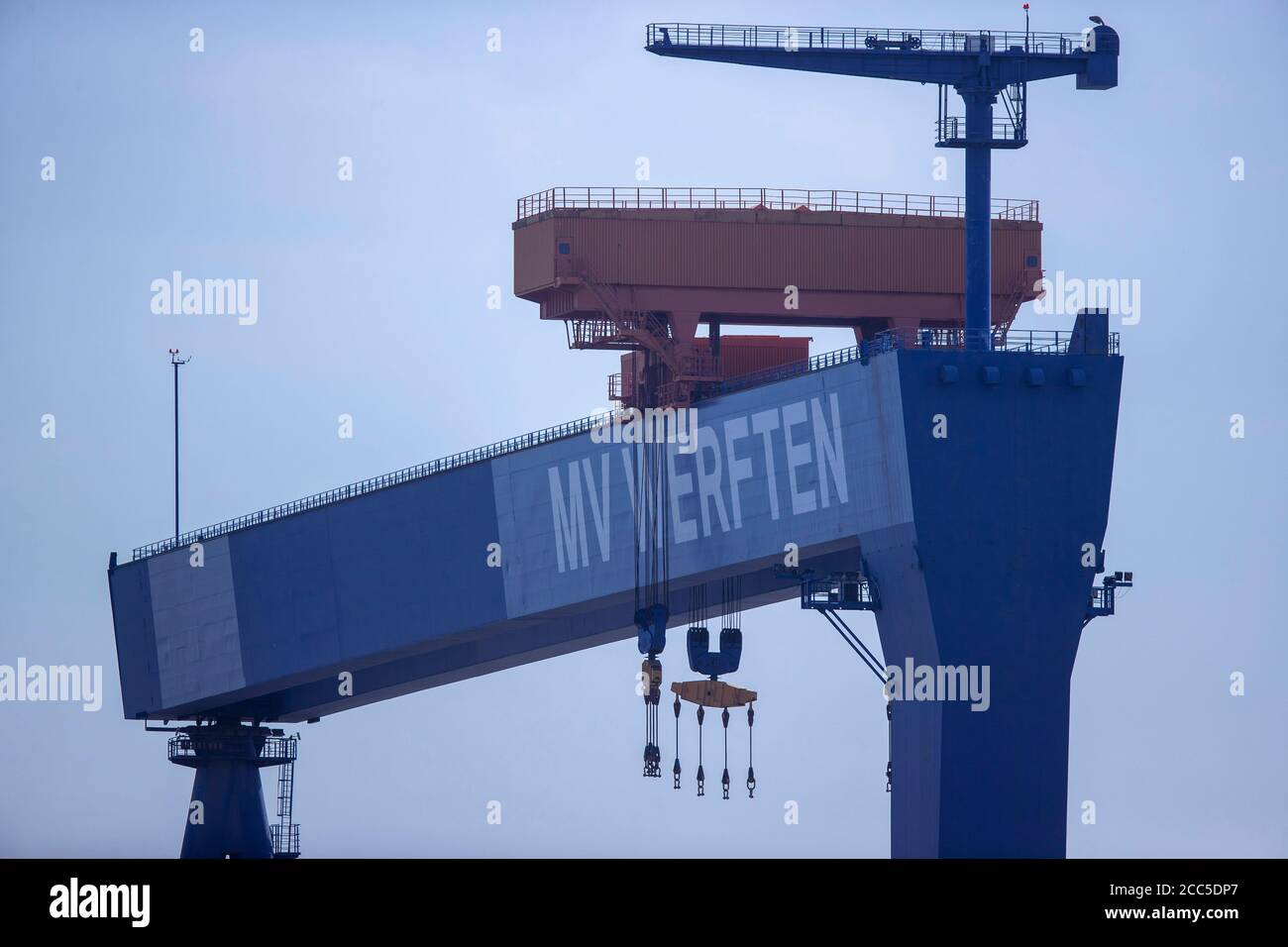 Rostock, Germany. 12th Aug, 2020. The gantry crane with the inscription