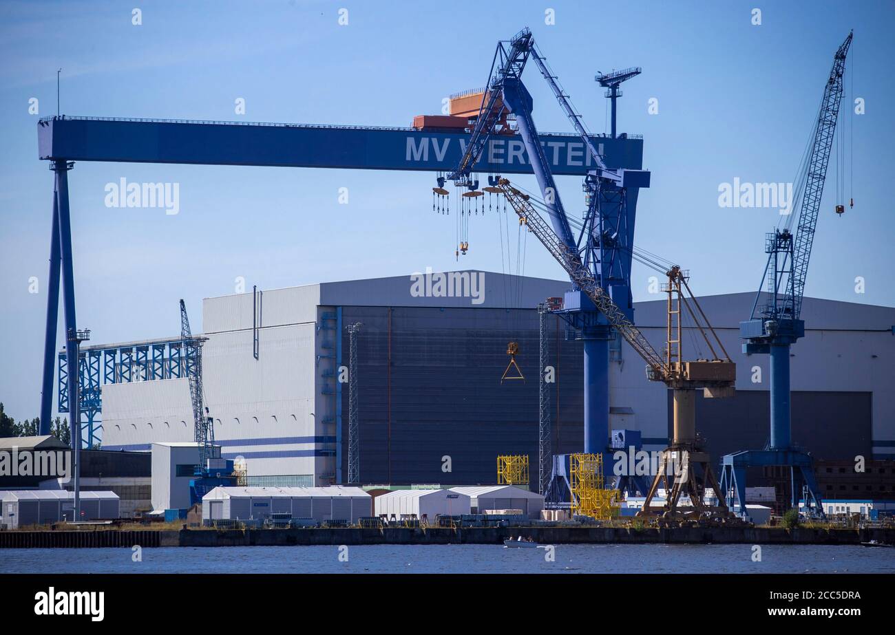 Rostock, Germany. 12th Aug, 2020. The gantry crane with the inscription