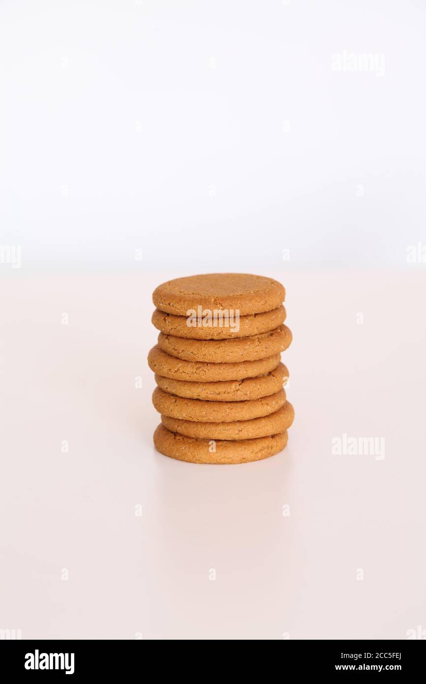 McVitie's Ginger Nuts stack of biscuits in a pile isolated on white background Stock Photo
