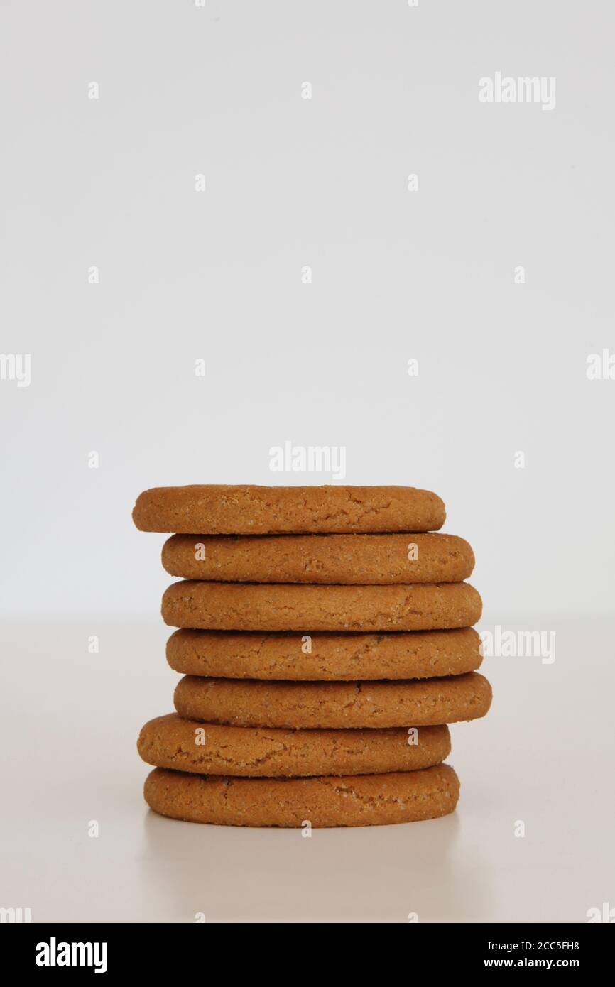 McVitie's Ginger Nuts stack of biscuits in a pile isolated on white background Stock Photo