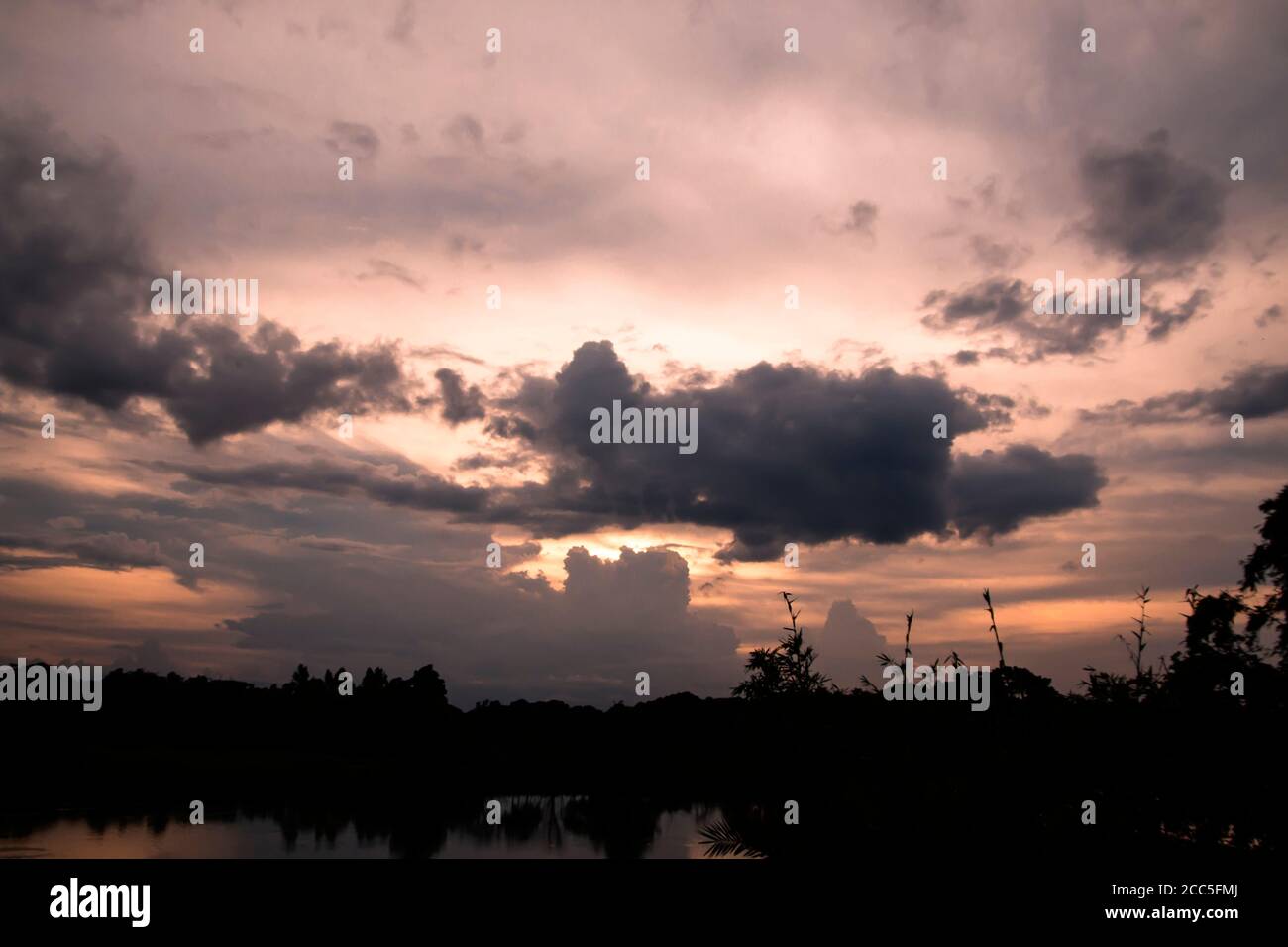 Stormy rain clouds background. Dark sky Stock Photo - Alamy