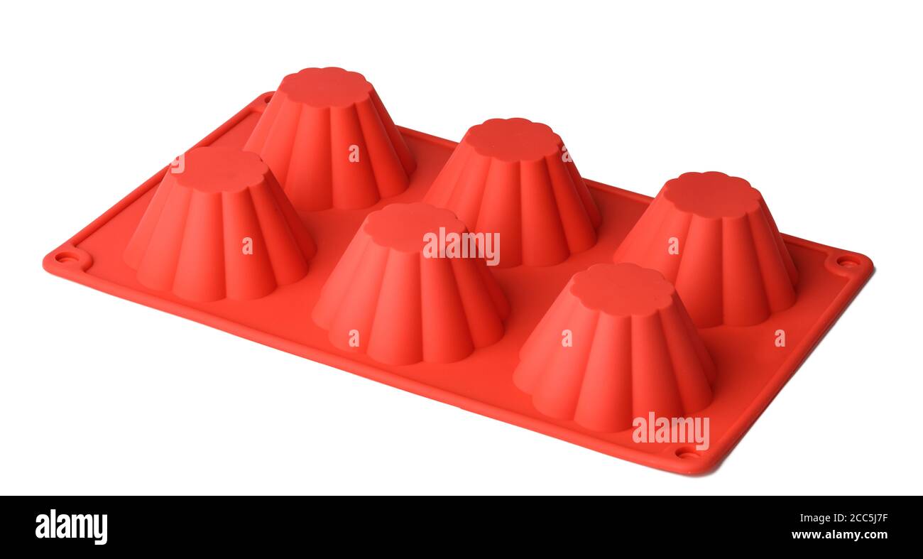 Silicone form for cupcake baking on white background Stock Photo - Alamy