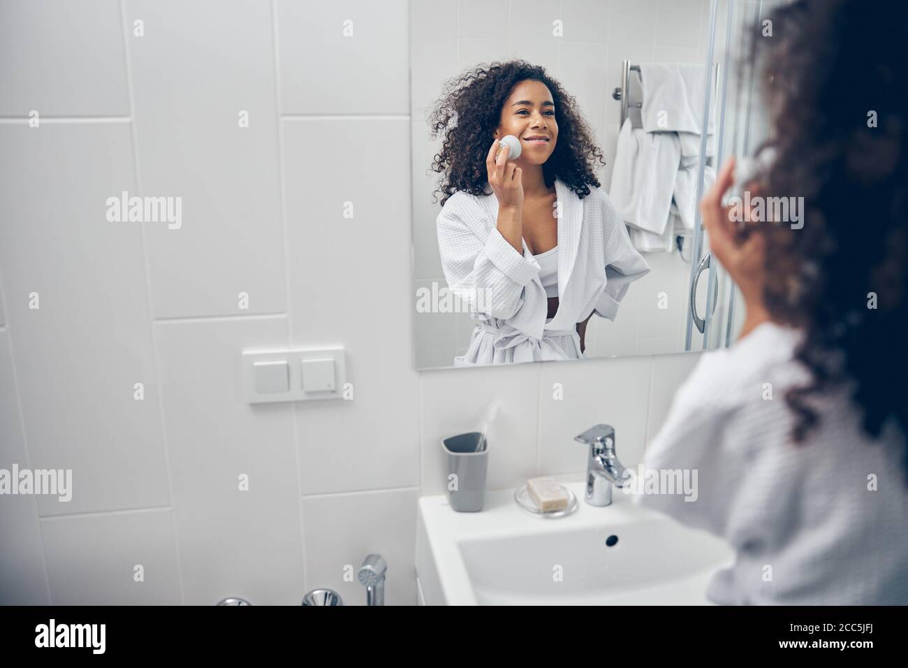 Lady using brush hi-res stock photography and images - Alamy