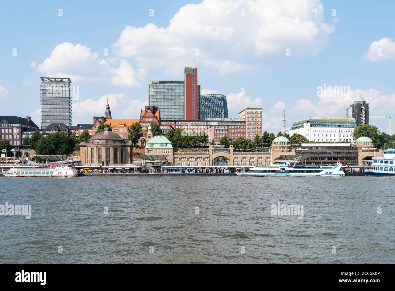 2020-08-16 Hamburg, Germany: waterside view of famous St. Pauli Piers and River Elbe against blue summer sky Stock Photo