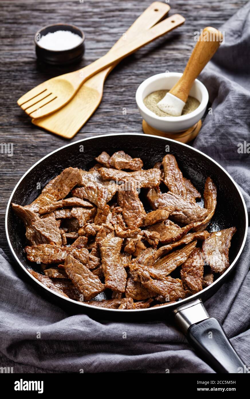 tender and juicy fried ribeye beef steak cut into strips, minute steak