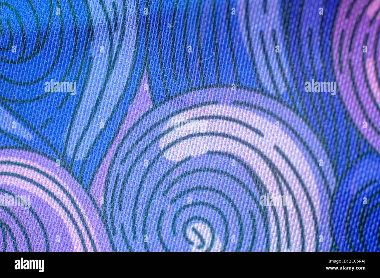 Spiral Psychedelic design in purple blue and reds Stock Photo