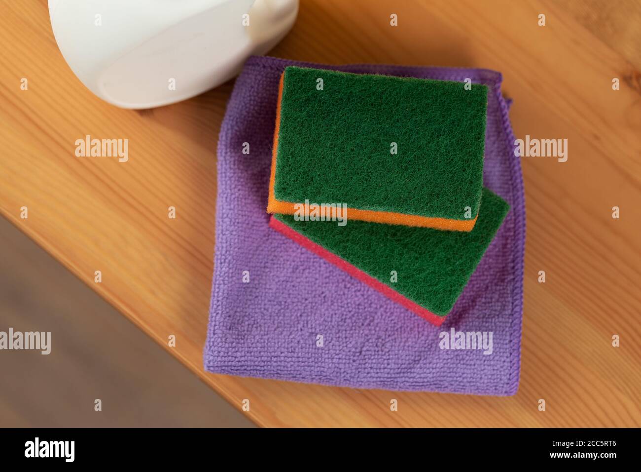 Cleaning detergents and tools on a kitchen counter Stock Photo Alamy